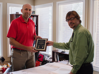 Matt Connolly, President, Landtech Resources Inc. in Williamsburg, graciously accepted the CSIIP plaque on behalf of his wife, Lisa, who hired three interns this year. 